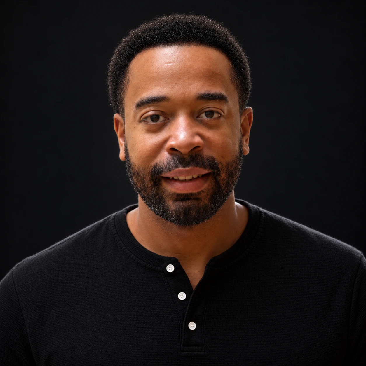 Jazz Parker in a black Henley